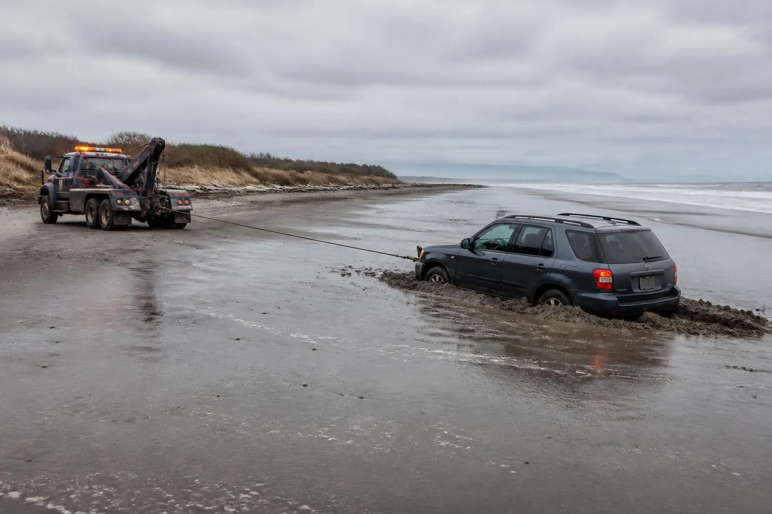 Professional winch out and beach vehicle recovery service on the Washington coast
